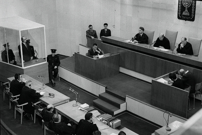 Black and white image of the courtroom during the Eichmann trial
