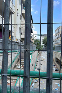 An image of a park in the Neve Sha’anan neighborhood in south Tel Aviv that is covered in broken glass in urine.