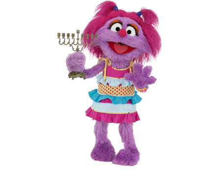 Learn about the Jewish Holiday of Hanukkah with Avigail and the characters from Shalom Sesame
