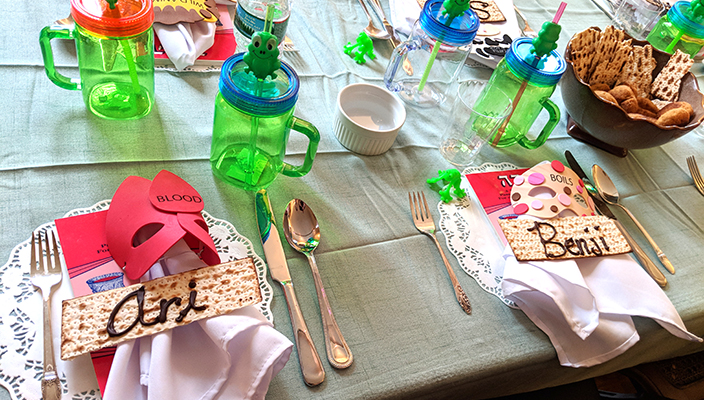 Passover seder table with child-friendly objects