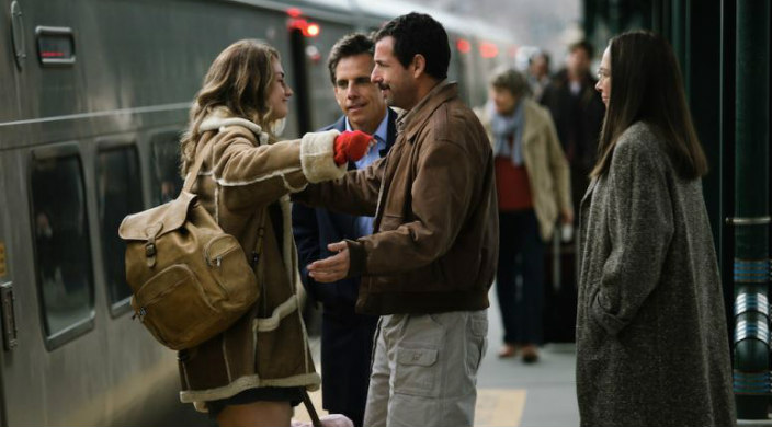 Adam Sandler and Ben Stiller character greet a young female character with a hug on a train platform as another woman looks on