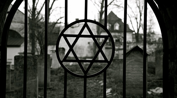 Star of David on wrought iron gate leading to old cemetery