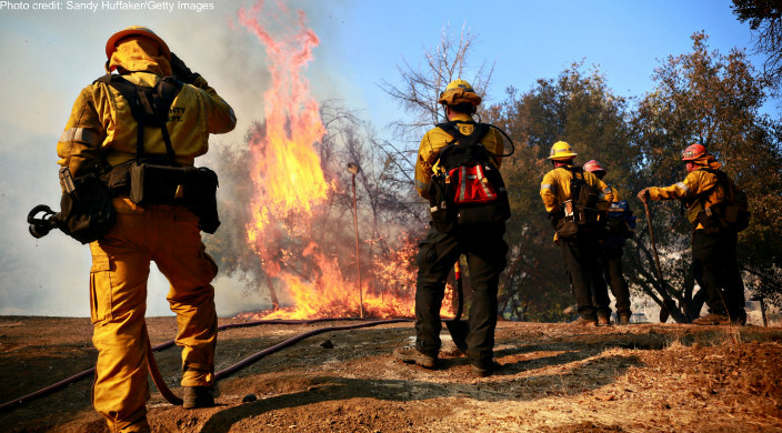 Three firefighters face the California wildfires 