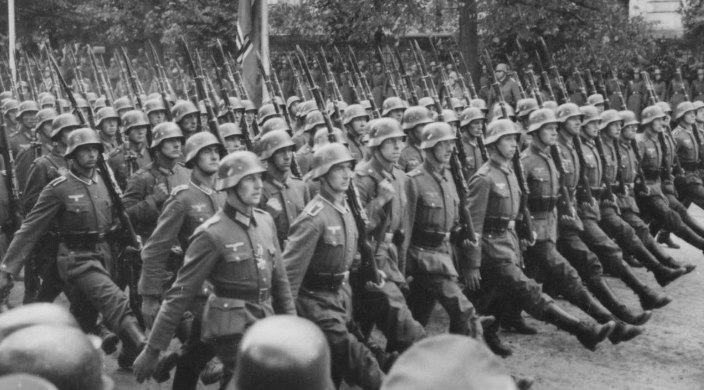 Black and white photo of the German army marching to invade Poland