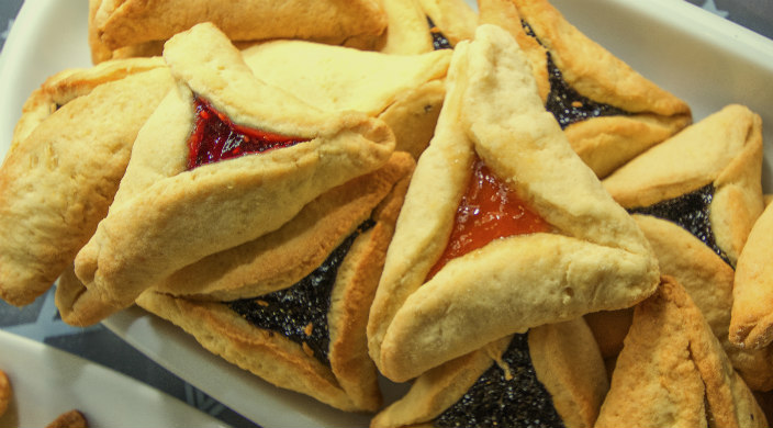 Plate of hamantaschen with different fillings