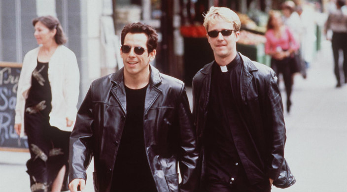 Ben Stiller and Edward Norton walking down the street dressed in leather