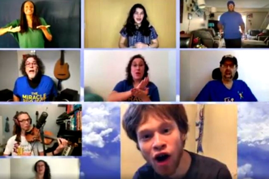 Screenshot from of One Breath music video depicting various people singing on a Zoom screen