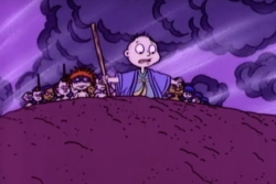 Screenshot from the Rugrats Passover special of Tommy Pickles parting the sea as Moses