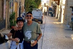 Marc and Karen Rivo smiling in the streets of Safed