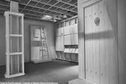 Interior perspective of The Evidence Room with models of Auschwitz gas column and gas tight hatch plaster casts and model of gas tight door