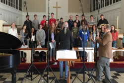 Students recording "Songs of Darkness and Hope" in a local church