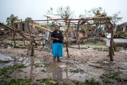 Woman in flood in Haiti