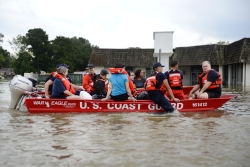 Flood victims rescued in a boat