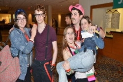 A group of teens laughing together in costume at NFTY Convention 