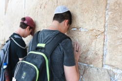 Two NFTY participants praying at the Kotel