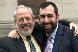 Author Rabbi Billy Dreskin and his mentee Rabbi Jason Fenster smiling with their arms around one another in celebration of Rabbi Fensters ordination