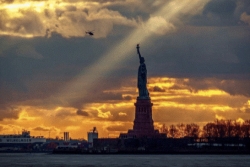 State of liberty against the sunset