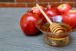 Apples, Pomegranates and Honey, foods that are integral to the customs and rituals of the Jewish holiday of Rosh HaShanah