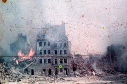 Grainy image of the Warsaw Ghetto in flames during the Warsaw Uprising 