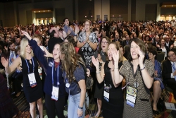 Group of people smiling and dancing at the 2015 URJ Biennial