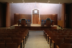 View of bimah (pulpit) and pews in a synagogue