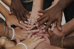 A group of hands of people of all races