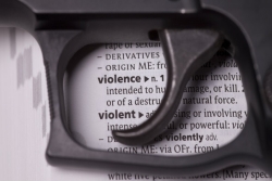 Handgun over dictionary definition of "violence"