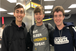 Three teenage boys wearing URJ 6 Points Sports Academy shirts