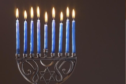 A menorah with candles for the Jewish holiday of Hanukkah