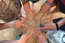 children forming a Jewish star (Magen David) with their fingers