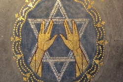 Tile sign of the Star of David with the Vulcan salute in front