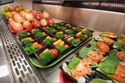 vegetable trays on a lunch line