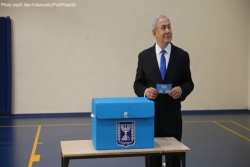 Israeli Prime Minister Benjamin Netanyahu casts his ballot at a voting station in Jerusalem