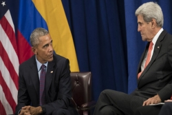 President Obama speaking with Secretary of State John Kerry