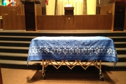 The pall covering a coffin in the sanctuary of Temple Isaiah in Lexington, MA