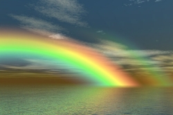 Rainbow over a body of water