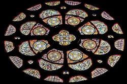 Large, ornate, multi-colored stained glass window